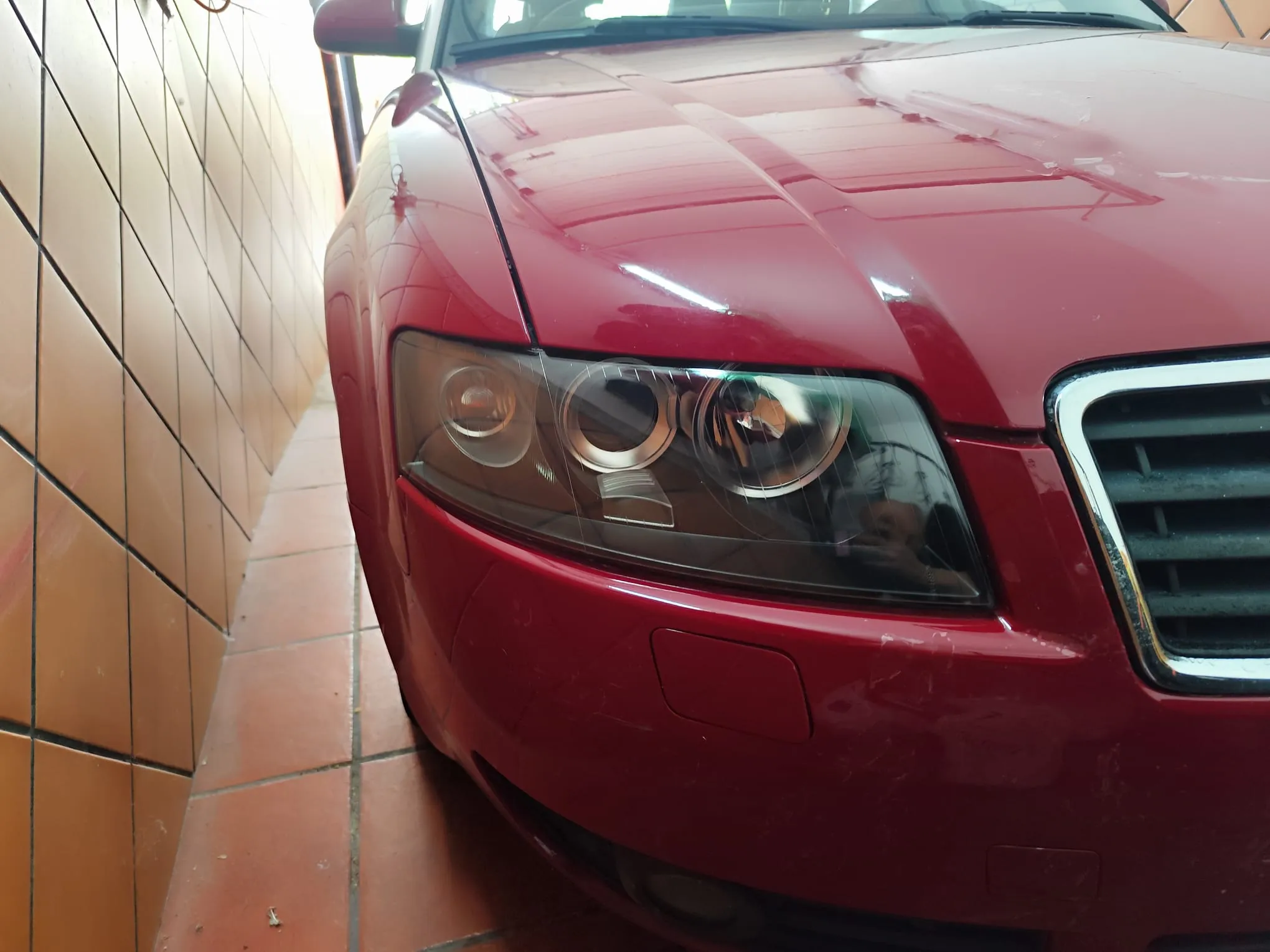 Faro de Audi A6 restaurado tras pulido profesional Lunarte